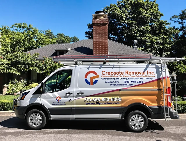 New Franklin Chimney Sweep technician removing creosote safely in New Franklin, OH